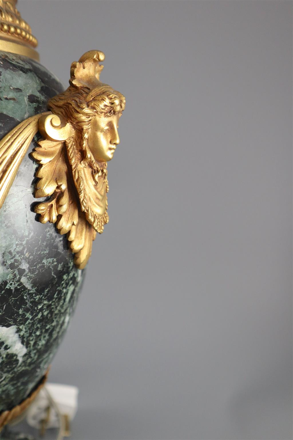 A pair of early 20th century ormolu green marble table lamps, overall height 20in.